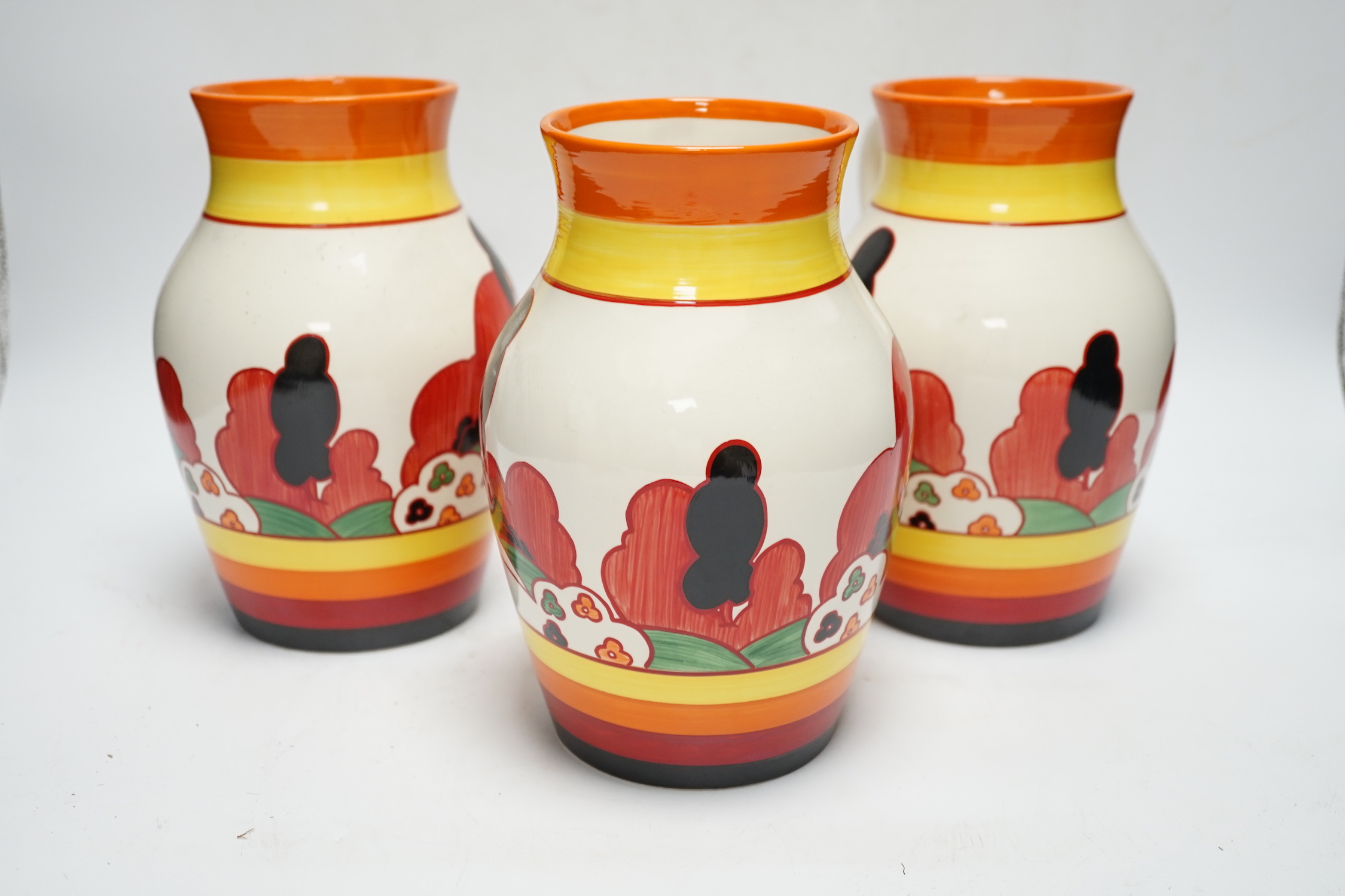 Three Wedgwood Bizarre Clarice Cliff Lotus jugs - Farmhouse pattern, limited edition with boxes and certificates, jugs 20cm high